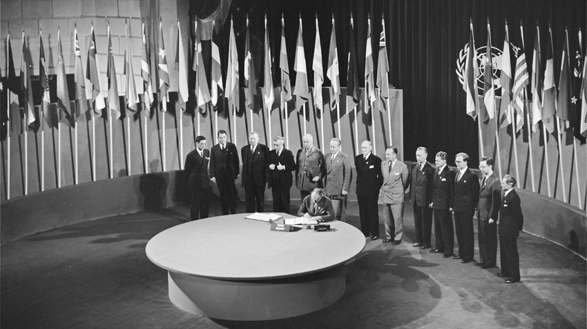 The Ambassador of Norway signing the UN Charter in 1945.